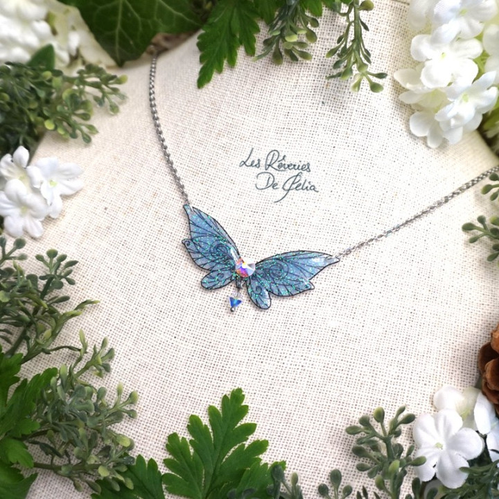 LUTINE - Mini collier ailes de fée bleu