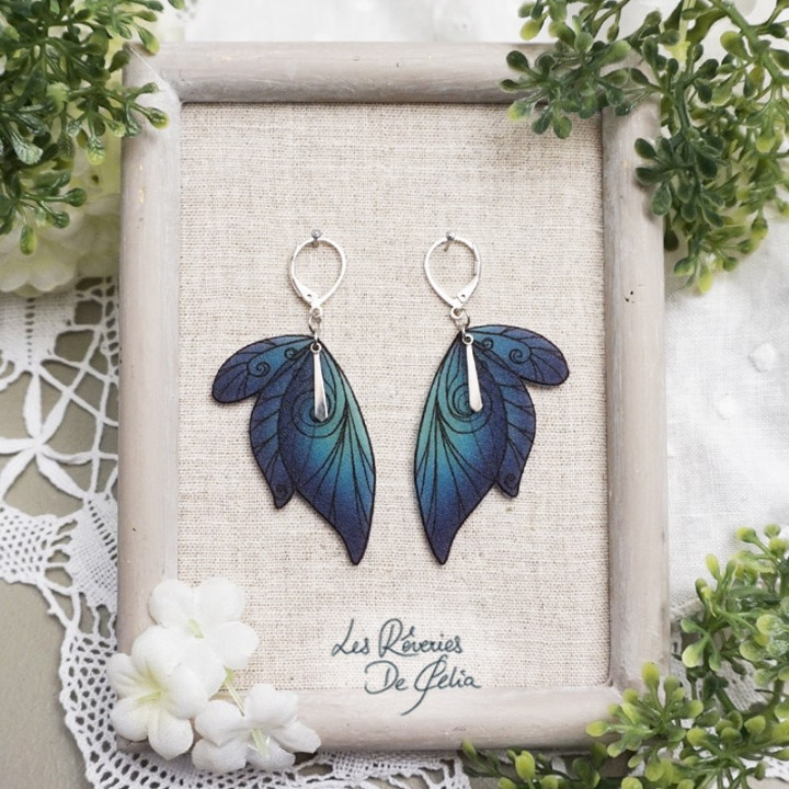 SÉLÈNE - Boucles d'oreilles ailes de fée argenté et bleu/turquoise