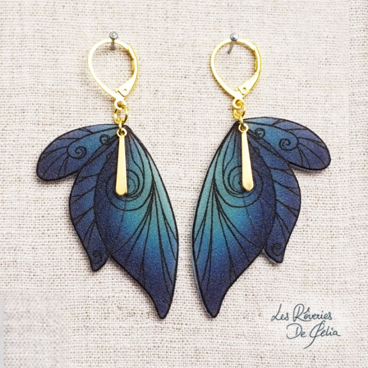 SÉLÈNE - Boucles d'oreilles ailes de fée doré et bleu/turquoise